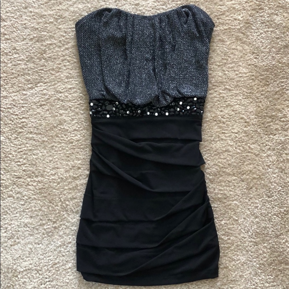 Beautiful black special occasion mini dress.